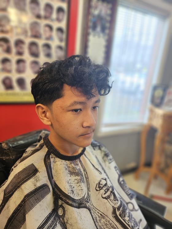 Fresh cut from the chair at Shawn Cutz