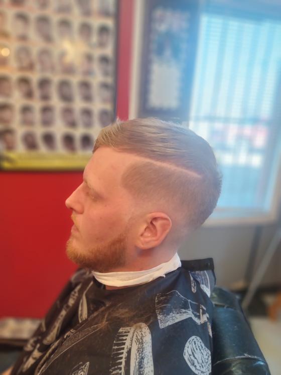 Client fresh out of the chair at Shawn Cutz