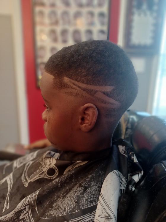 Client fresh out of the chair at Shawn Cutz